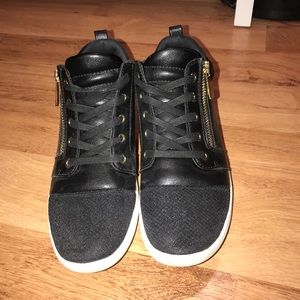 Black and gold zipper sneakers